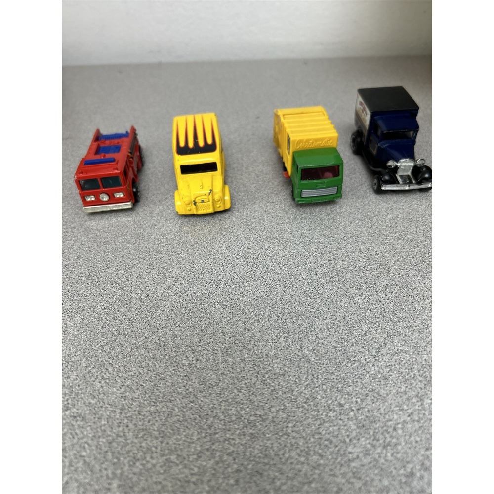 Mixed Lot Hot Wheels & Matchbox Trucks,‎ Model A, Fire Eater, Big Lou's, Refuse.